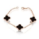 10091_fashion-plaza-rose-white-gold-finish-white-black-simulated-pearl-shell-flower-bracelet-with-cubic-zirconia.jpg