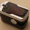 119079_finger-pulse-oximeter-sm-110-with-carry-case-and-neck-wrist-cord.jpg